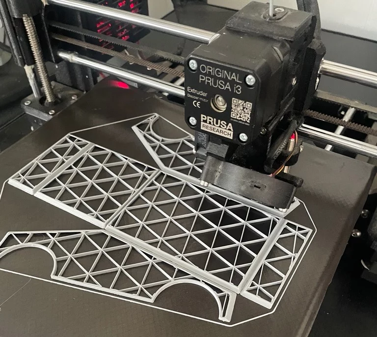 A Cybertruck model gets printed out