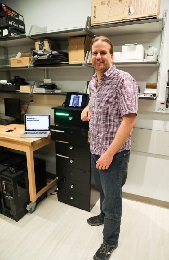 Dr. Winslow Burleson, with the prototype dresser
