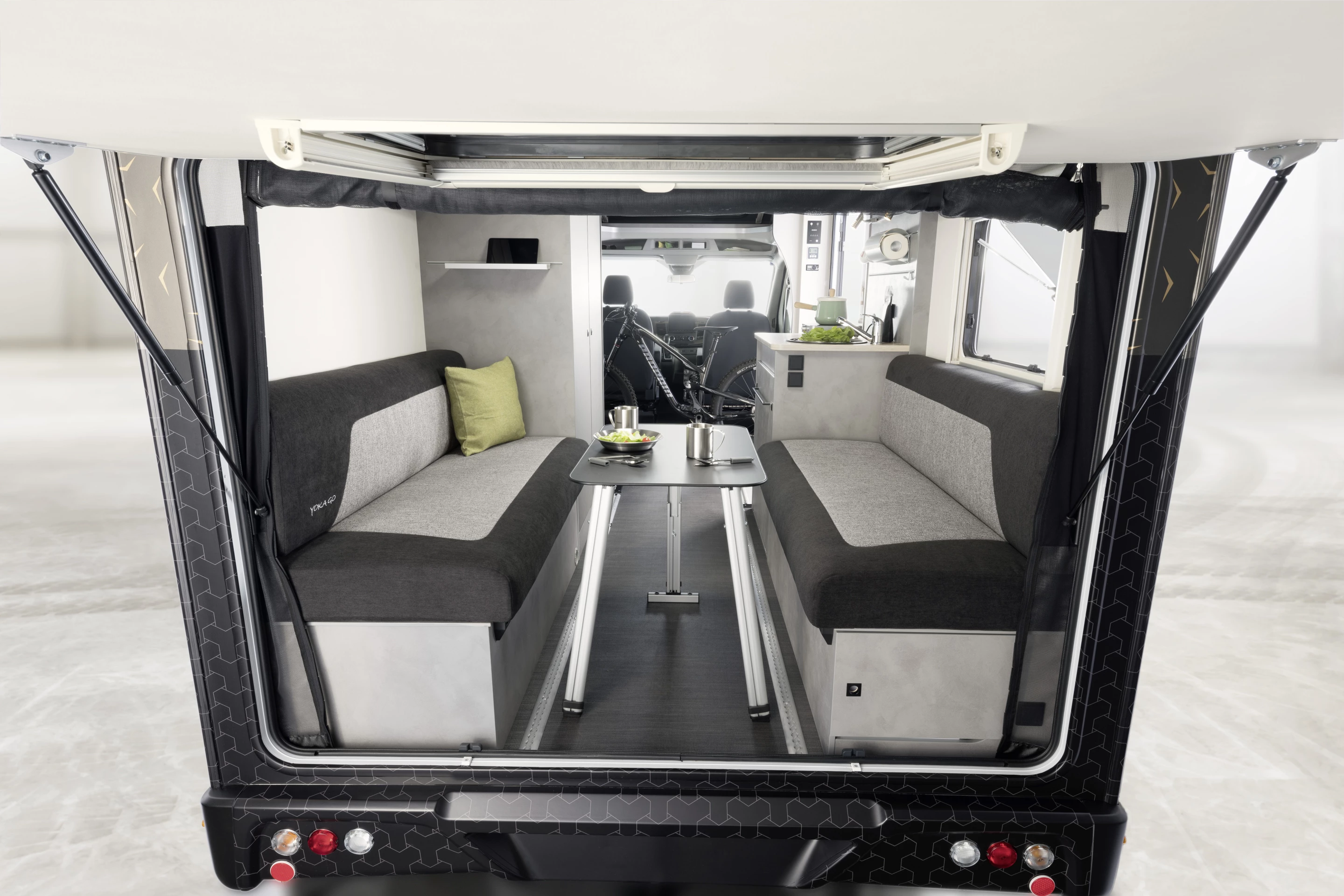 The removable freestanding dining table works in back, up front or outside