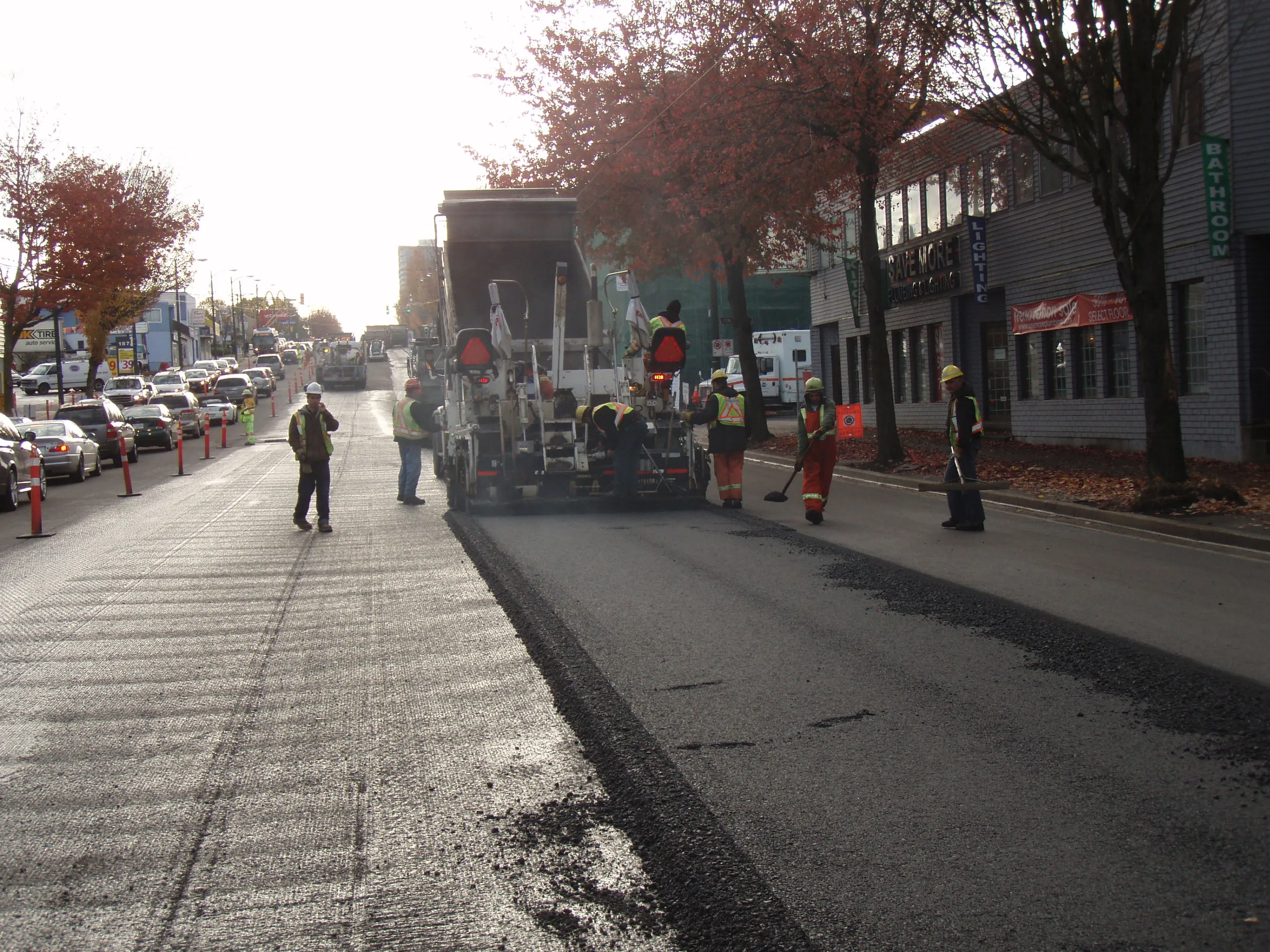 The warm mix truck laying the new asphalt mix at one of the trial locations in Vancouver
