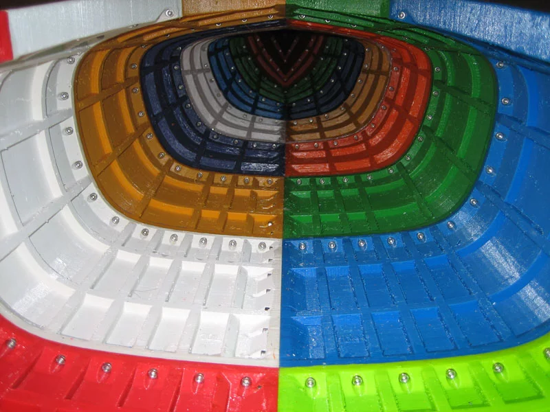 The kayak's 28 sections have been bolted together with machine screws and brass-threaded thermoplastic inserts, and sealed between sections with silicone caulk