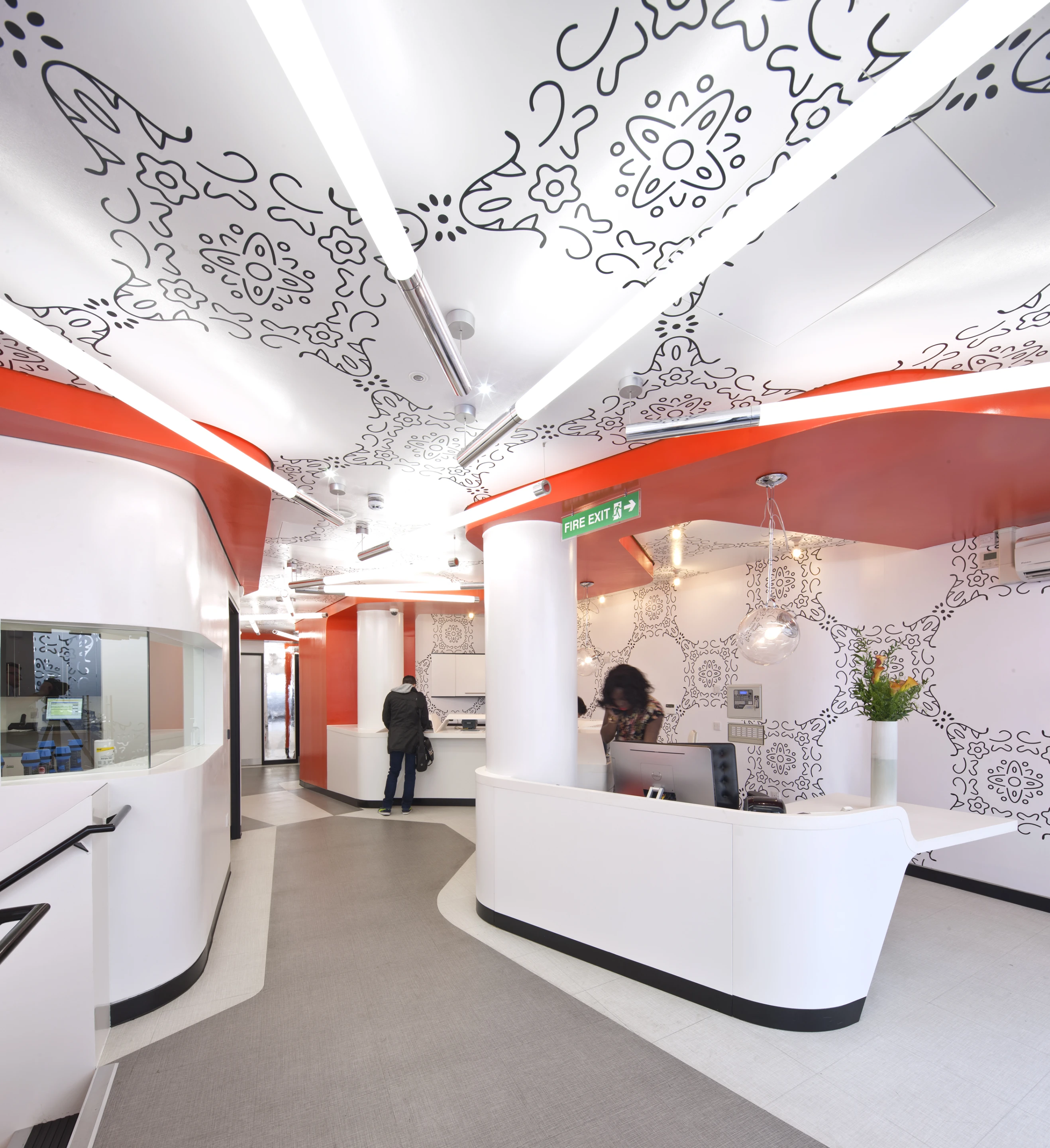 The NHS Dean Street Express clinic was designed by Penson architects and features a high-tech system that allows patients to do all of the administration for themselves