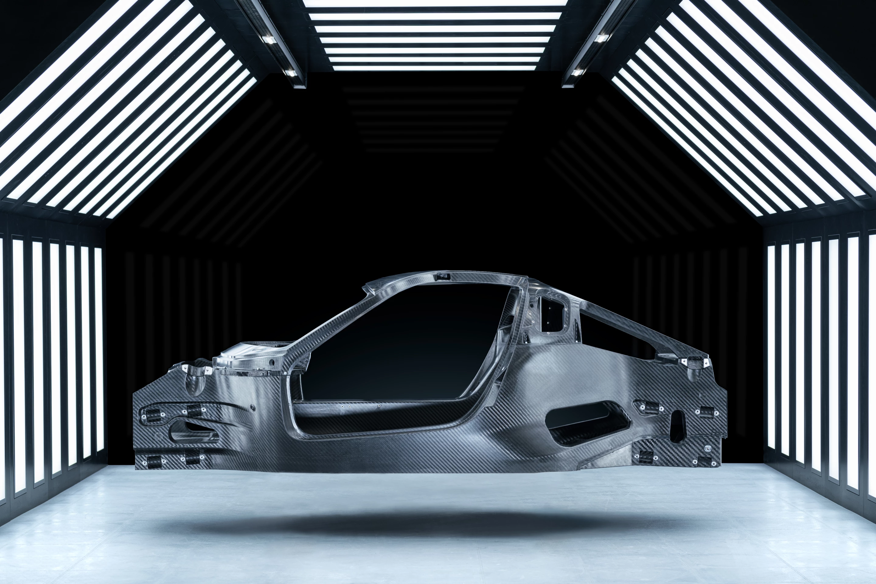 The Nevera's carbon fiber monocoque incorporates the structural battery pack and bonded carbon roof