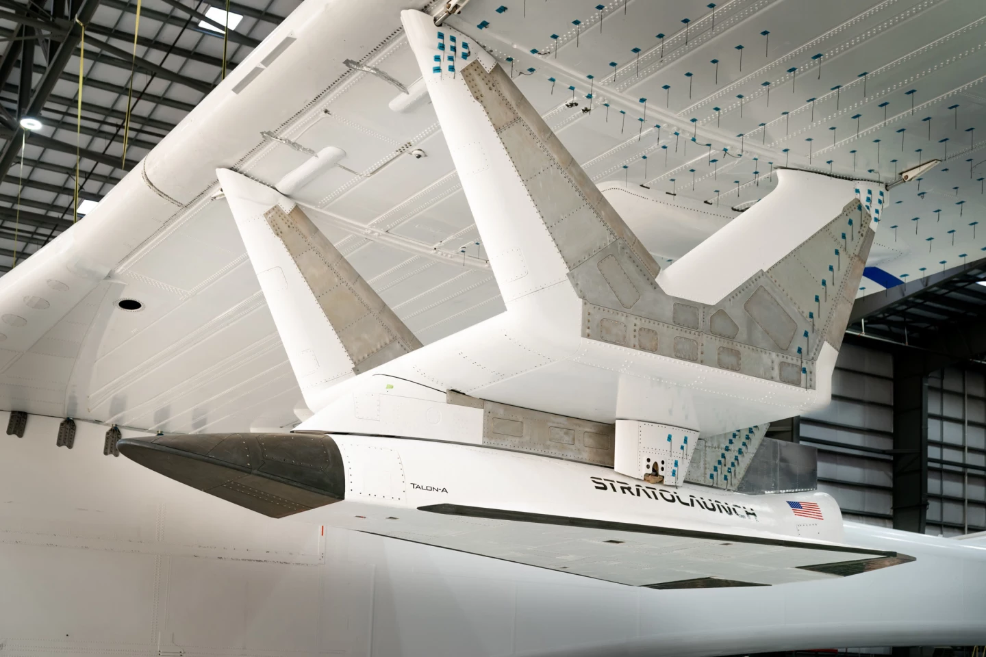The TA-0, attached to the pylon which will both carry and release it