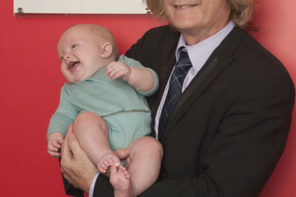 Cheyenne Crow from Exmovere Holdings with child wearing Exmobaby pajamas(Photo: Liz Roll)