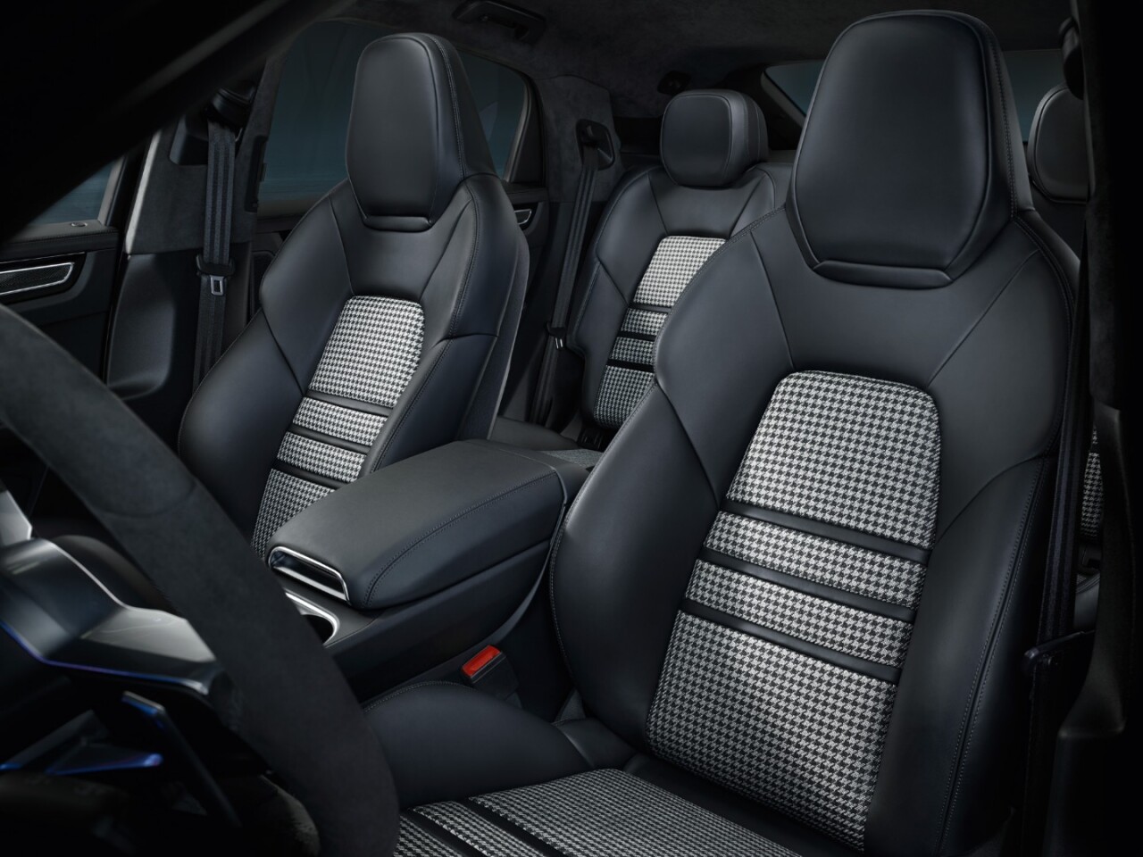 Porsche lowered the rear seating by over an inch to accommodate the lower roof and retain interior headroom