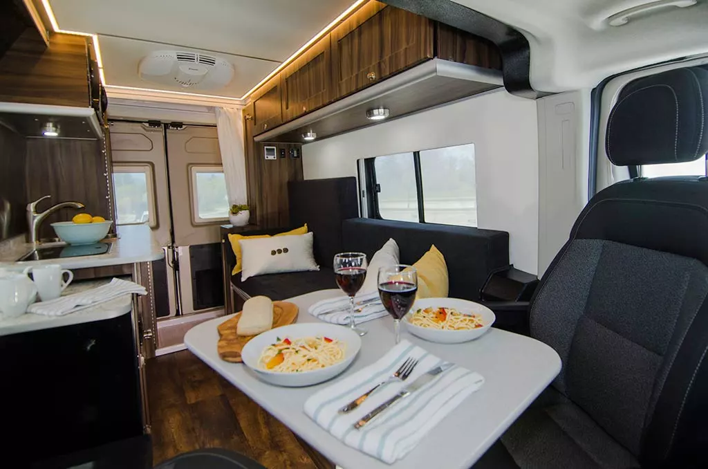 With a capacity of two people, the Axion doesn't need a larger dining area, relying on the removable table and swivel seats