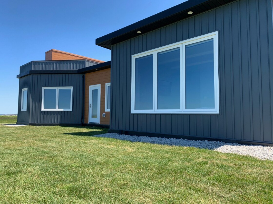 Beach House's prefabricated panels also provide the home with protection from moisture and mildew