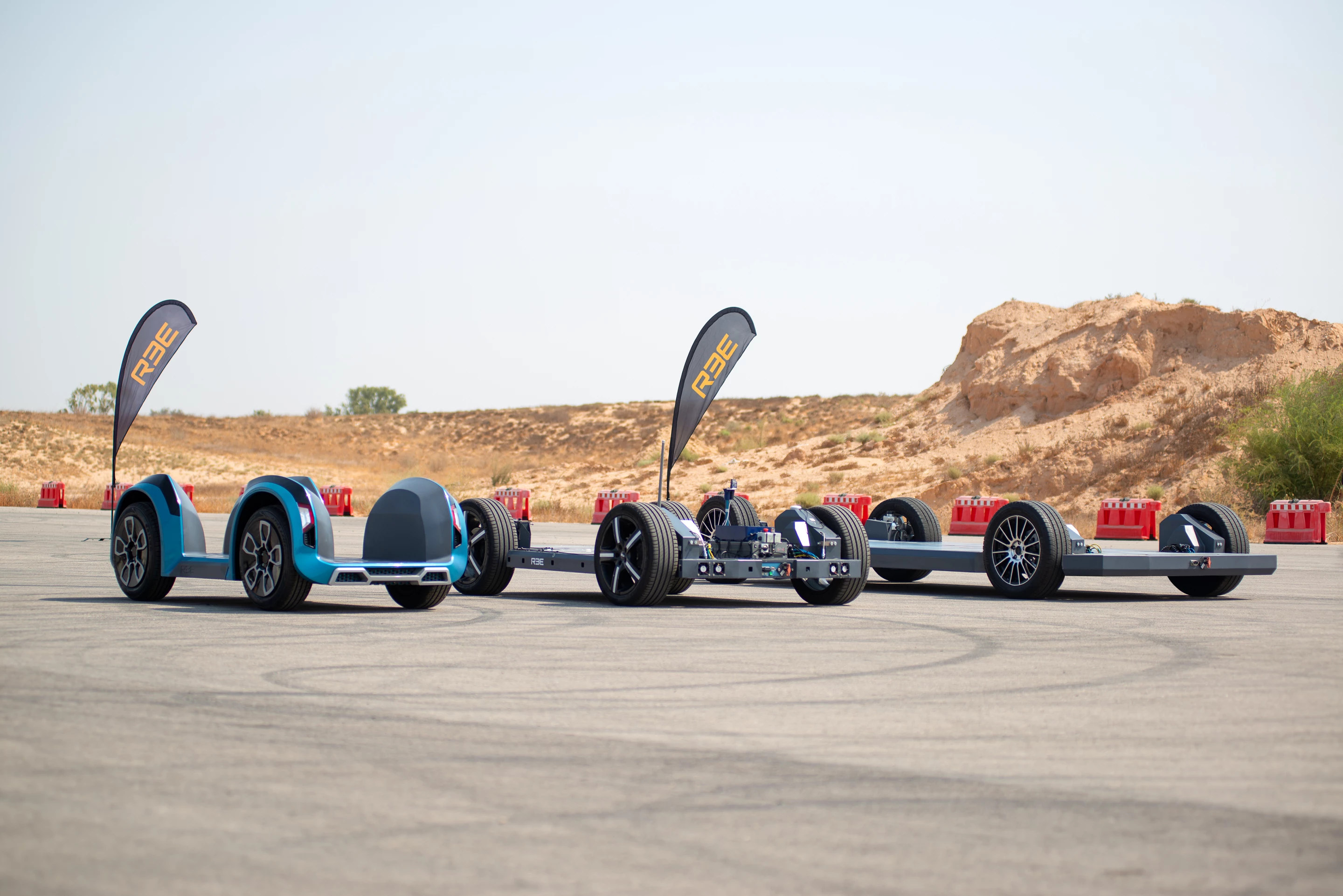 REE's P1, P2 and P4 platforms line up at the racetrack