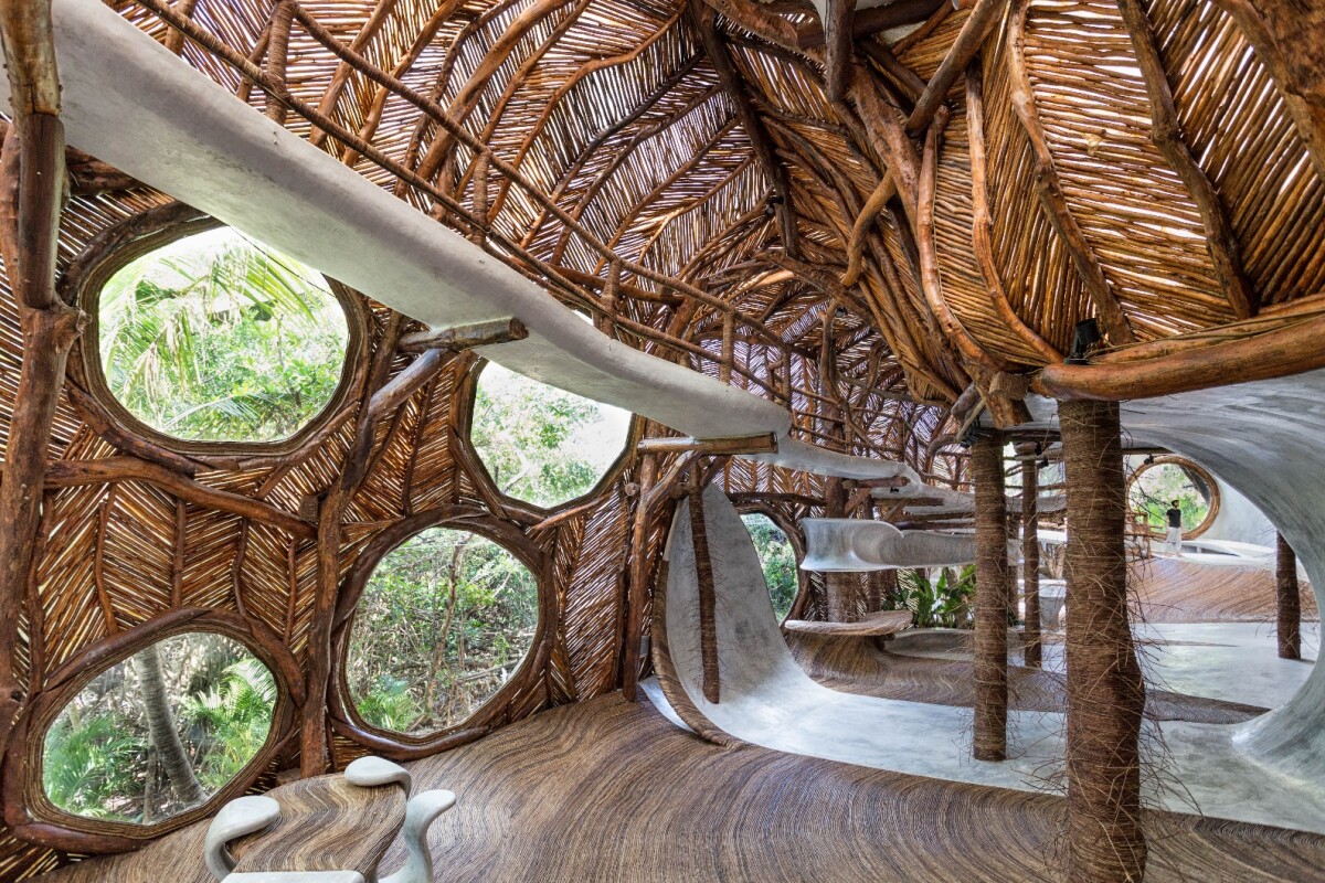 Large circular windows let loads of light into the IK Lab in Tulum, Mexico