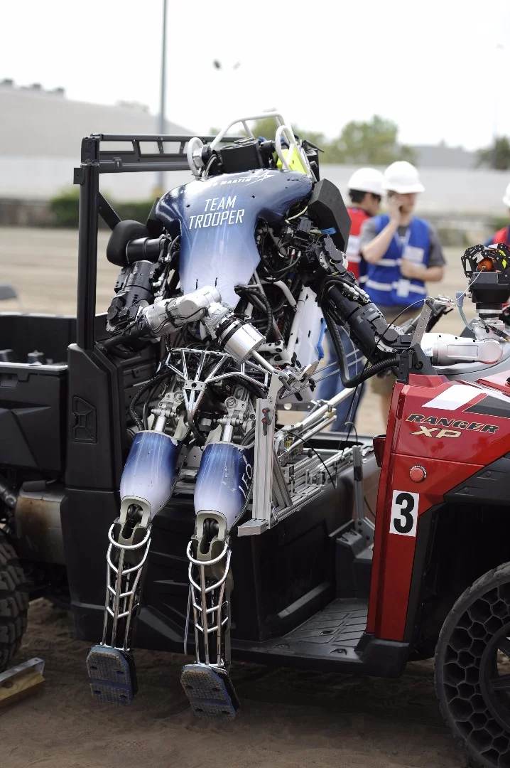 Robot Leo getting out of the car – one of several challenges faced by robots during the competition
