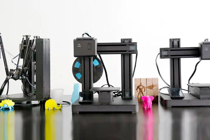The Mooz system allows users to switch between 3D printing, CNC carving and laser engraving through interchangeable heads