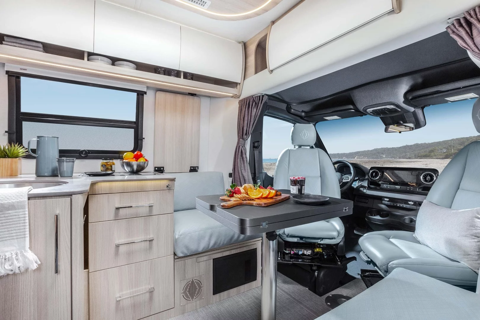 Leisure designed the Unity RL with grandparent/grandkid trips in mind, offering two passenger seats with belts, four dining seats and an optional front bed conversion