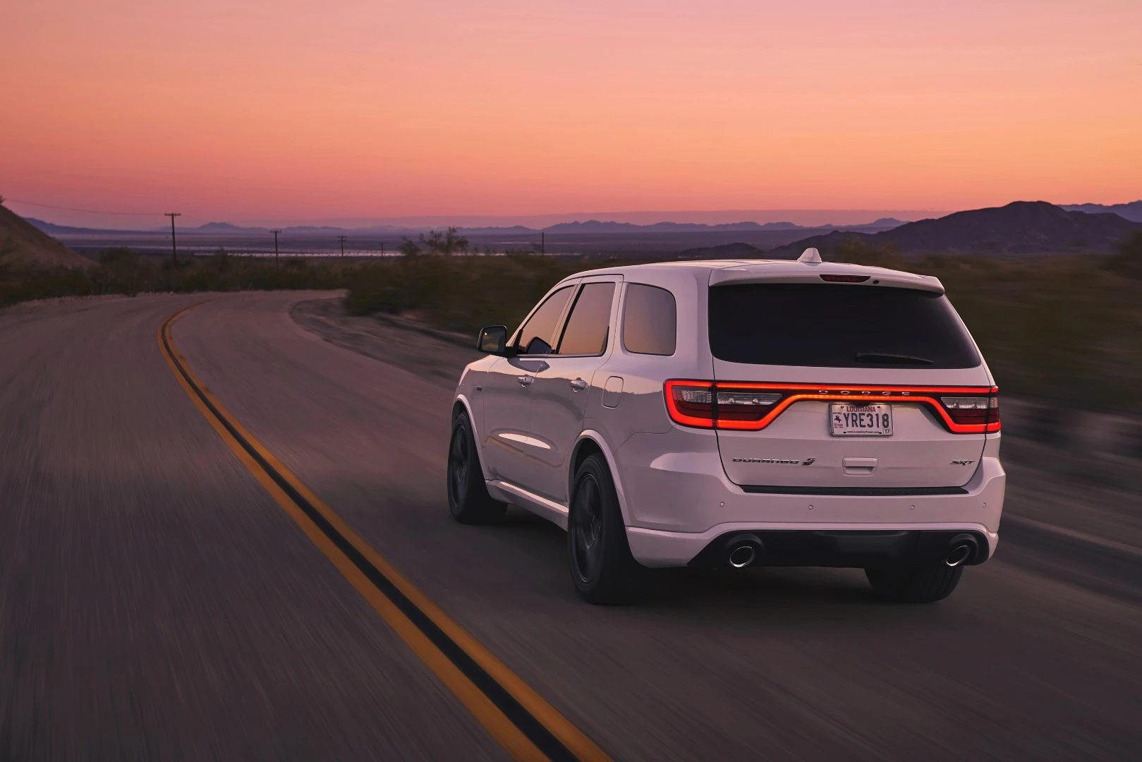 This is a three-row family SUV that has a National Hot Rod Association (NHRA)-certified track time