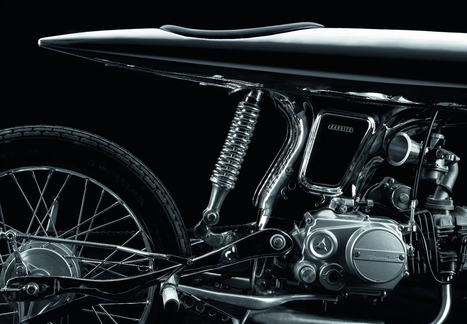 The Eve MK II custom leather seat is fully integrated into the unibody of the bike