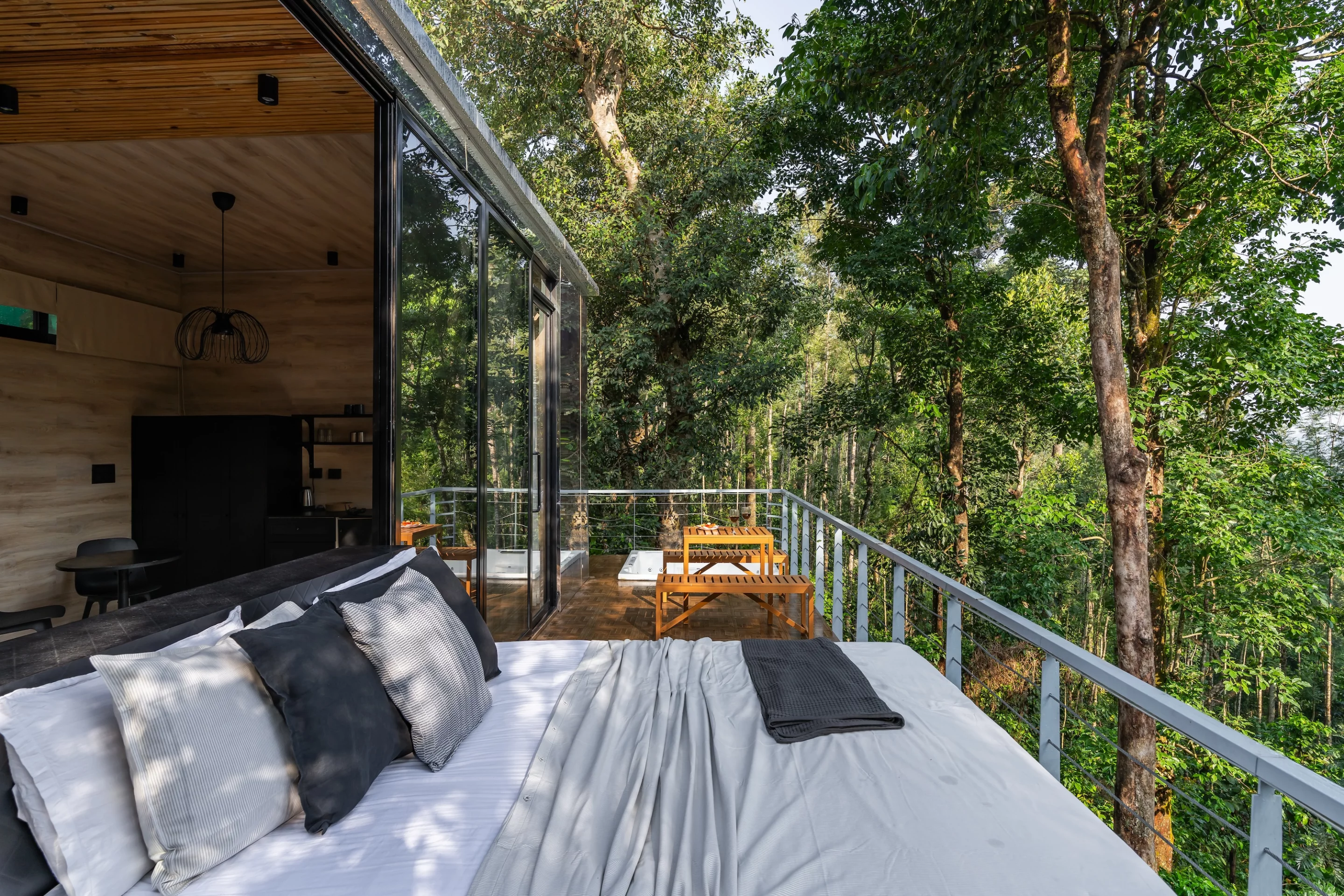 Reflections' balcony includes a dining area and a hot tub