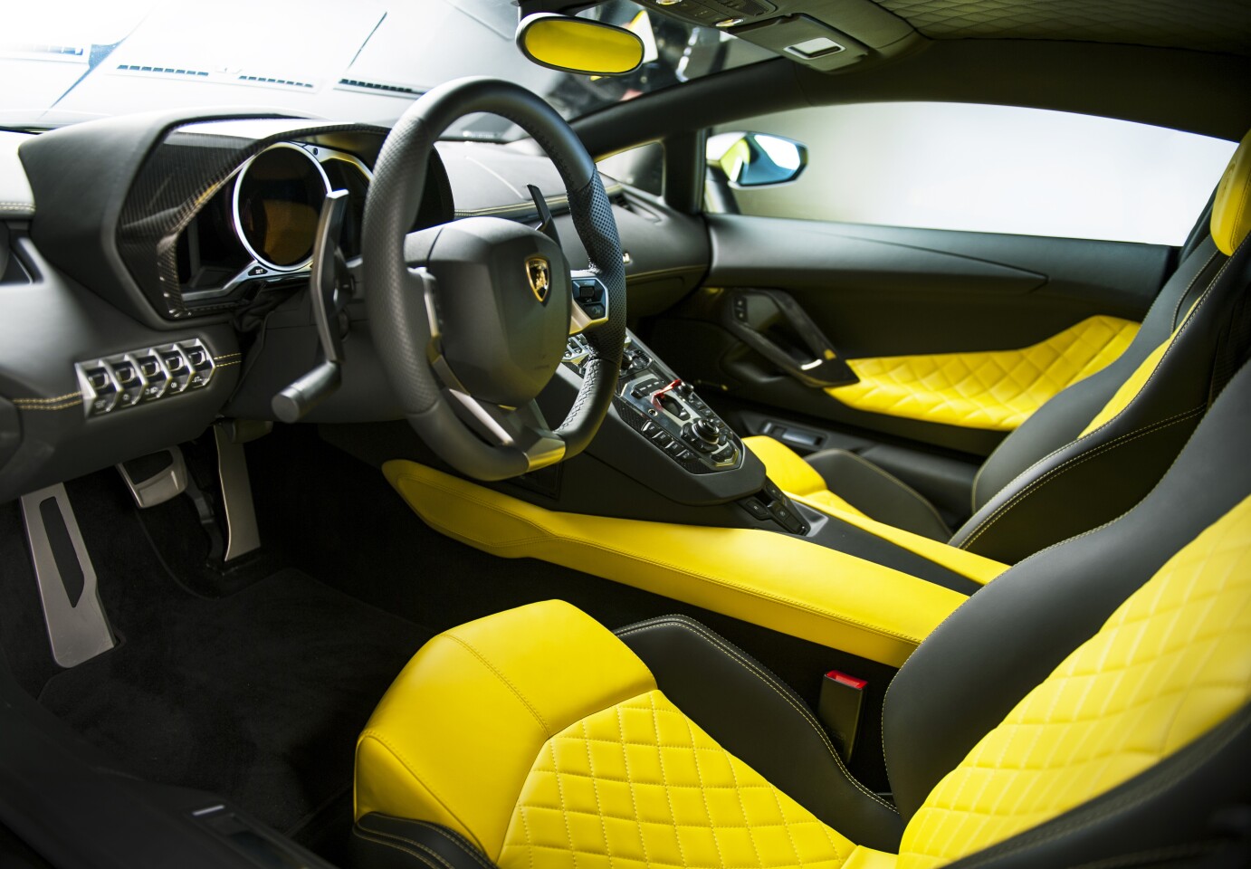 Limited edition Aventador is as bumble-bee as they come with upholstery of fine, natural, semi-aniline leather and an exclusive diamond pattern inset in the seats and doors