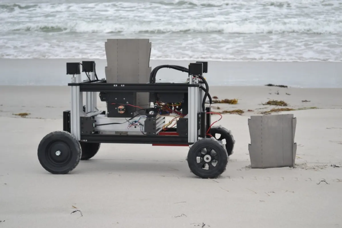 The Romu robot, seen here inserting sheet piles in the sand