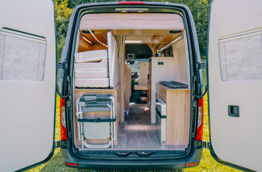 The foldaway bed is a great solution for surfers, skiers, bikers and others who want to load big, long gear into the van