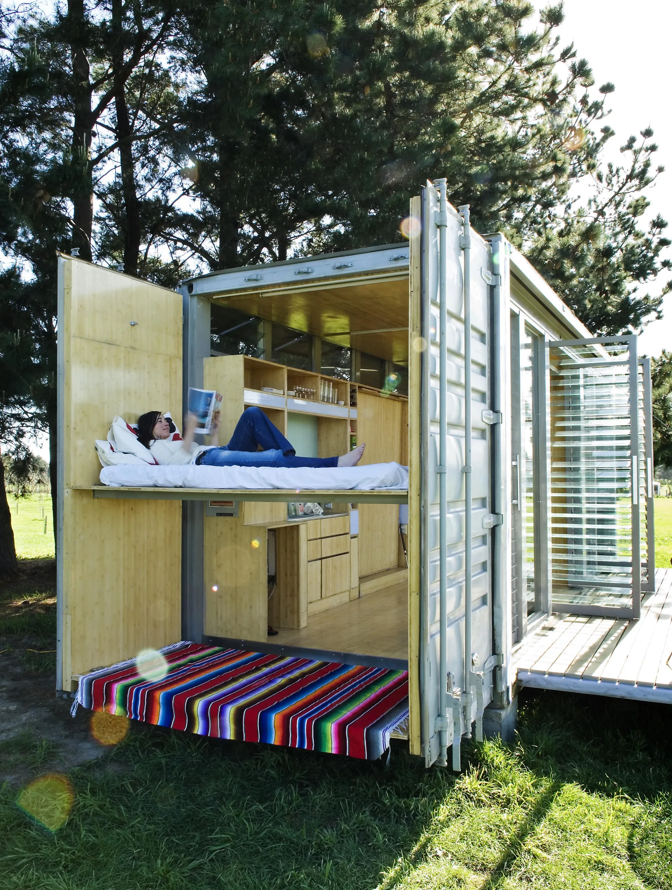 The double doors at the short elevation are fitted with folding bunk beds (Photo: Paul Macredie, from the forthcoming book "Superlight")