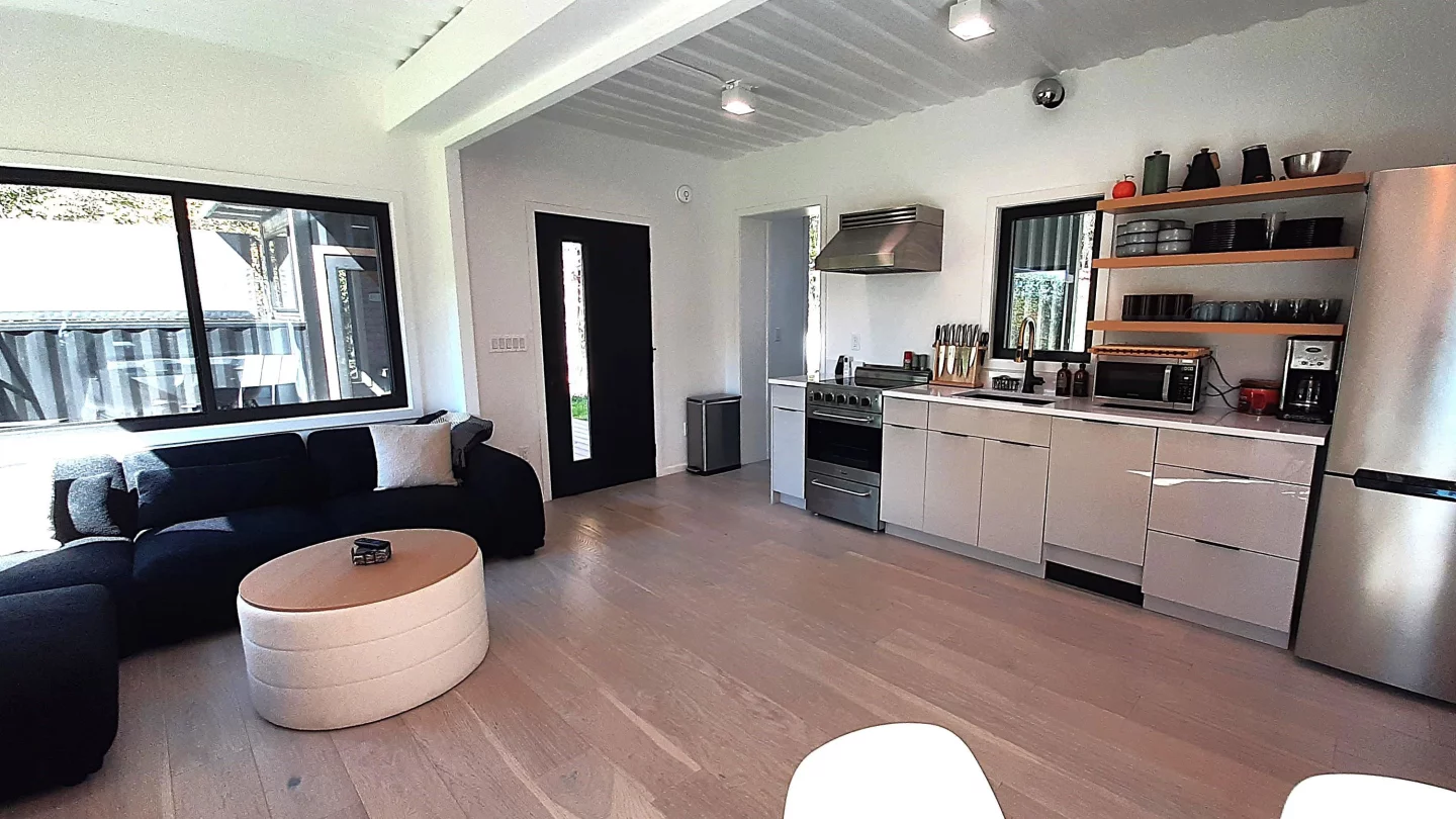 The Vermont Villa's interior is remarkably spacious for a container-based home