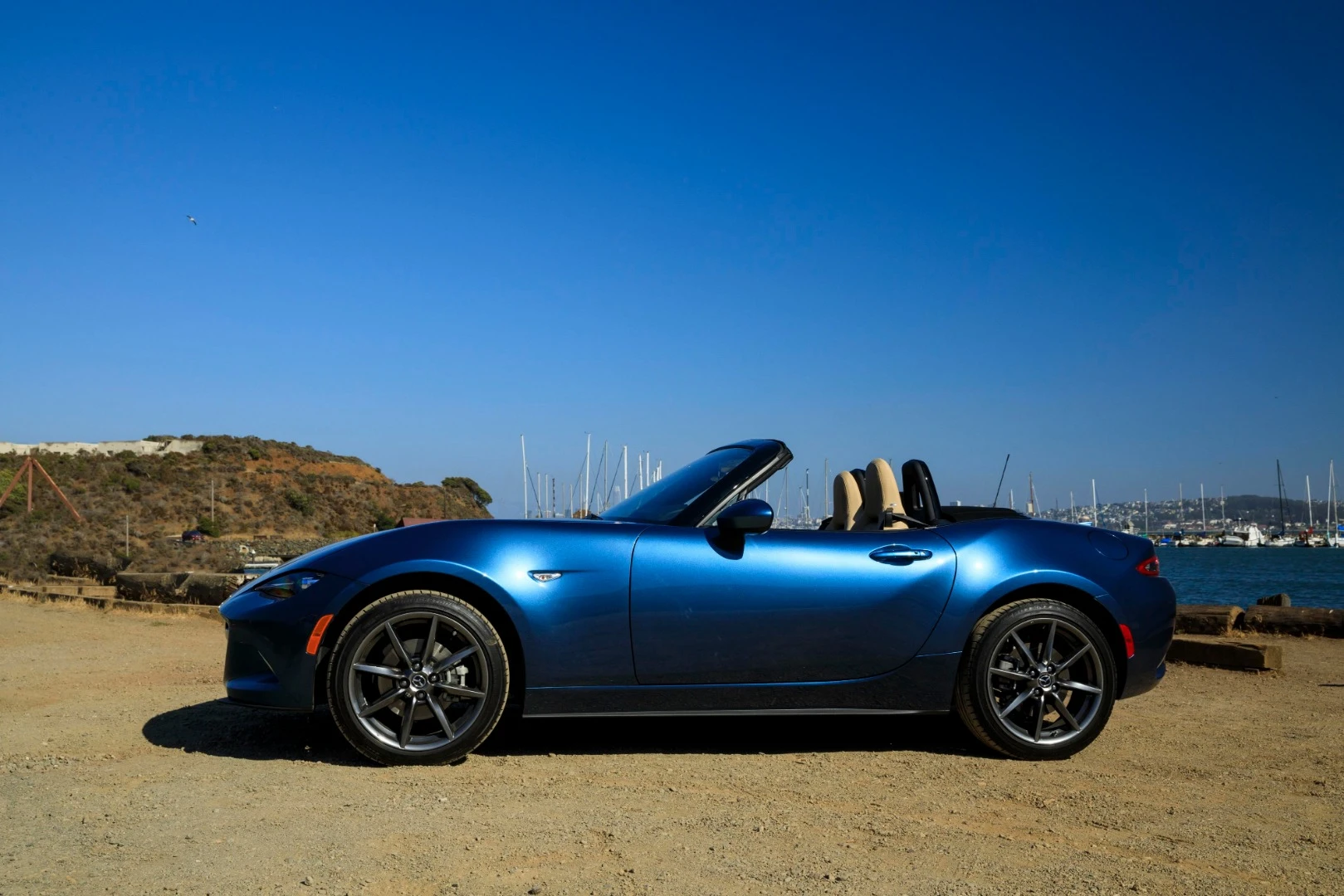 With its roof down, the 2019 Mazda MX-5 Miata is a fun, sporty little car made for good times