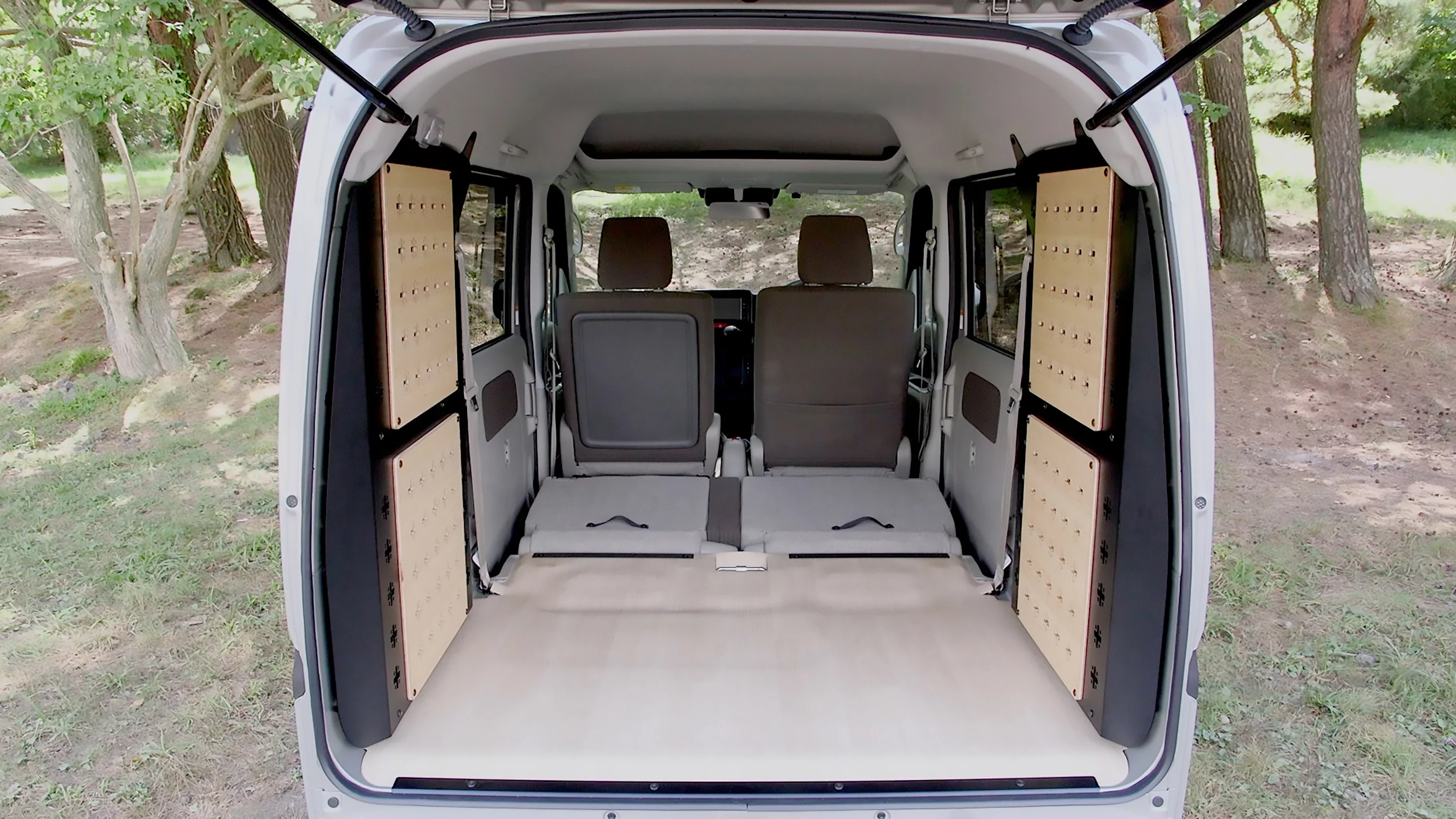 The Nissan Clipper's rear seats fold flat to make way for the deployable Multi-Rack bed