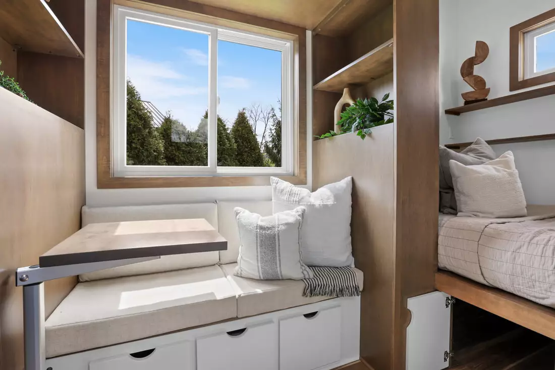 Mi Casita's living room includes some storage space under the sofa