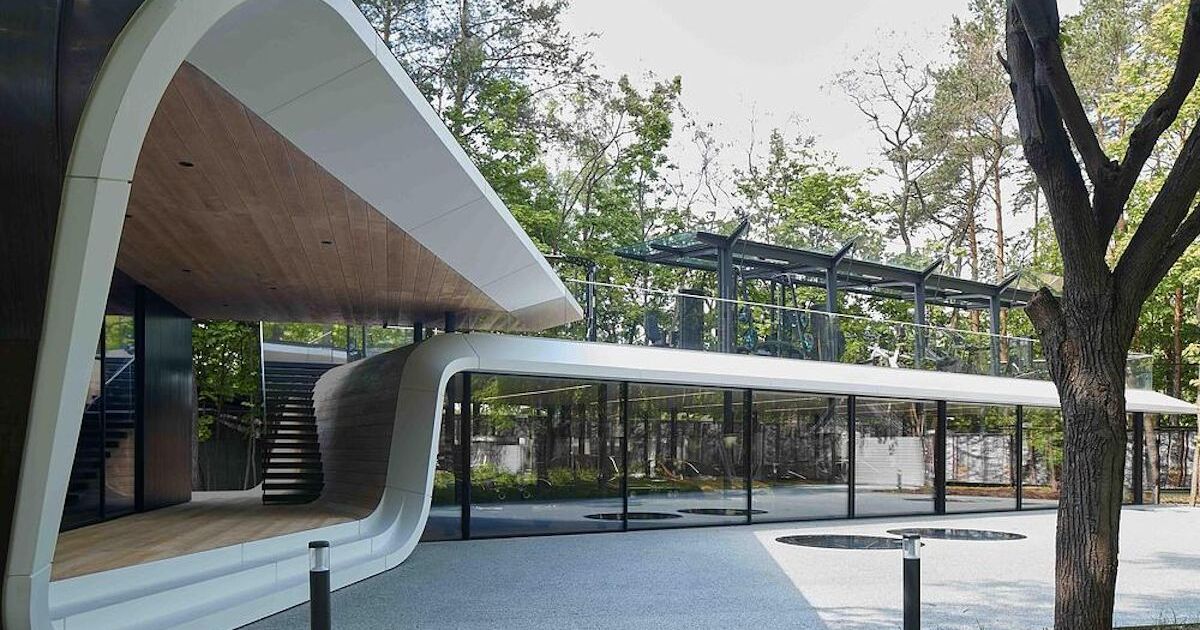 Luxury car collection hidden inside a forest garage