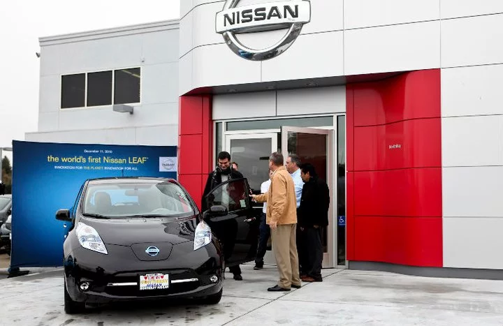 Olivier Chalouhi takes delivery of his new Nissan LEAF