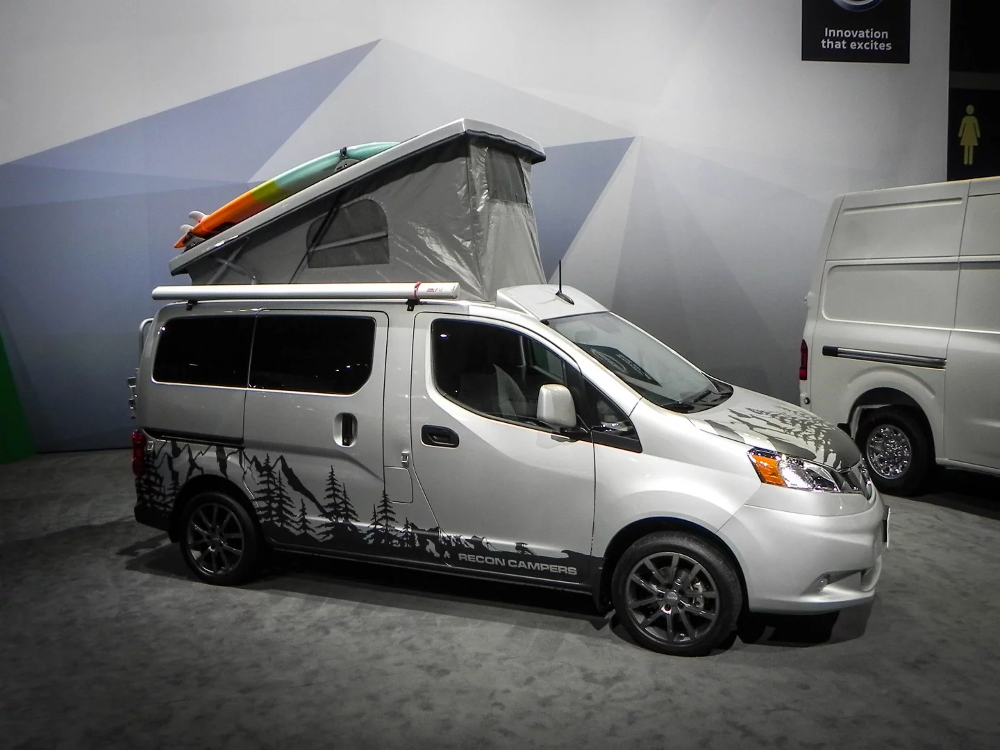 In the Nissan booth at the Chicago Auto Show are things like this aftermarket camper upgrade for the little NV commercial van