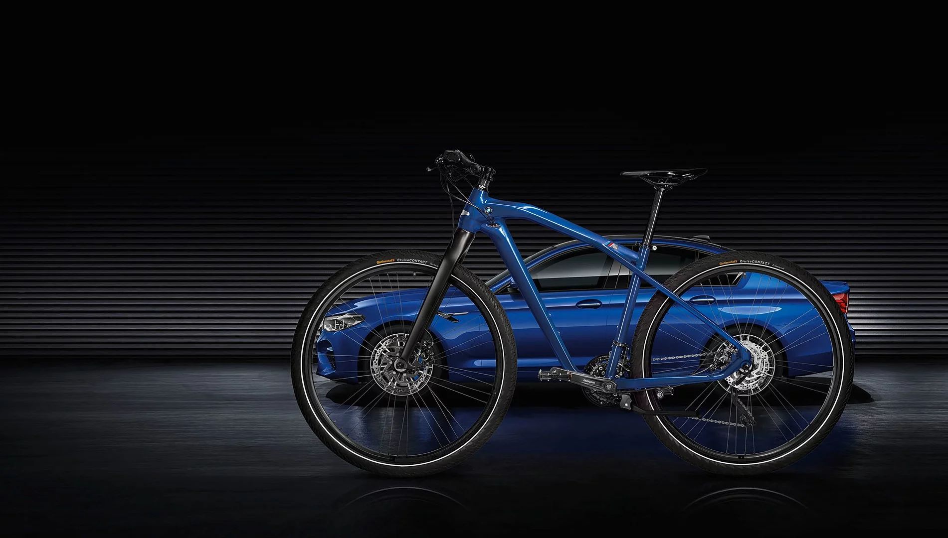 The BMW M Bike Limited Carbon, with the M5 in the background