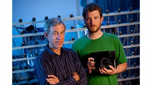 Marc Levoy, professor of Computer Science and of Electrical Engineering and graduate student Andrew Adams with the open source camera