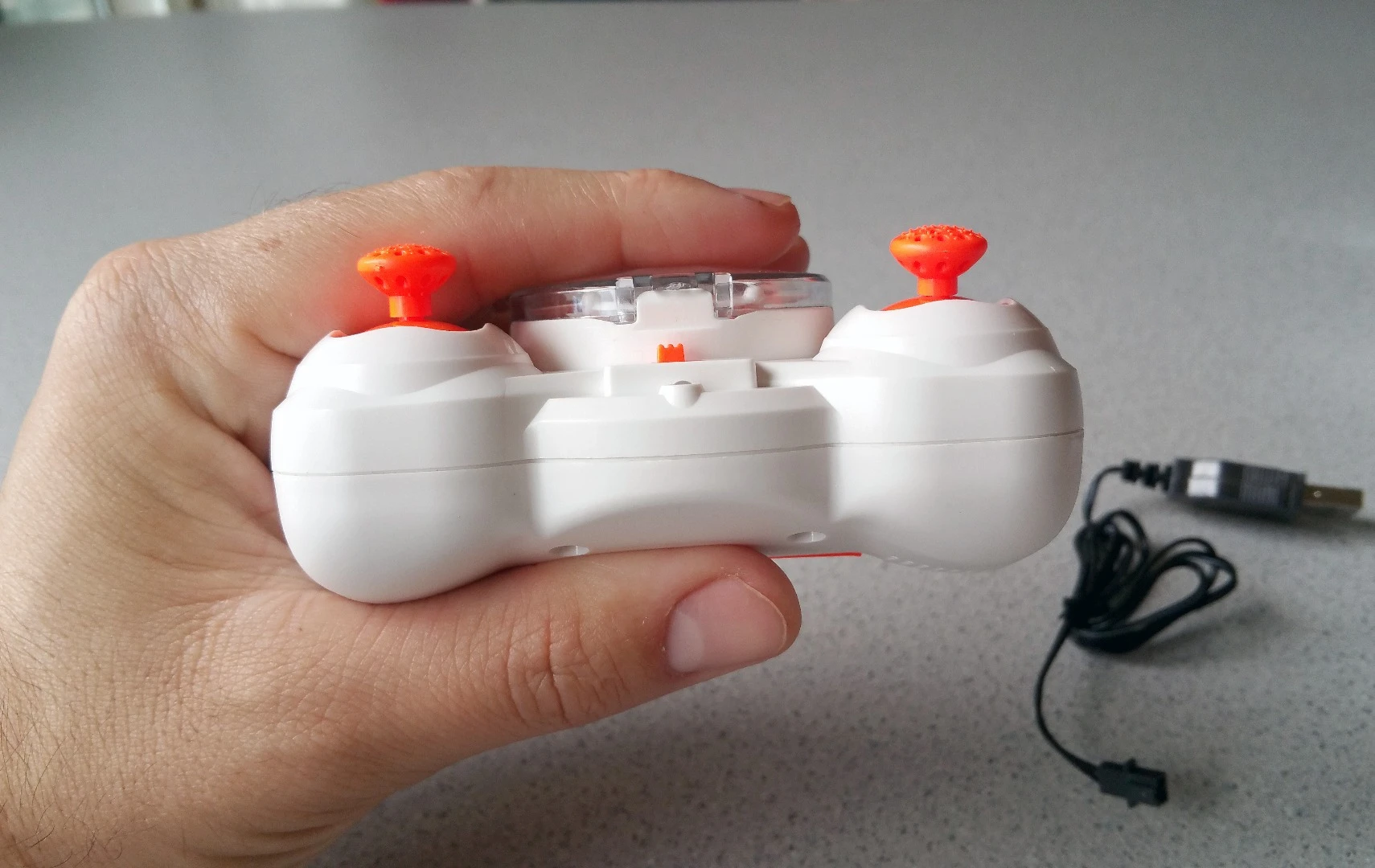 The transmitter for the Axis Drones Aerius quadcopter can be carried in bags or pockets for fun almost anywhere