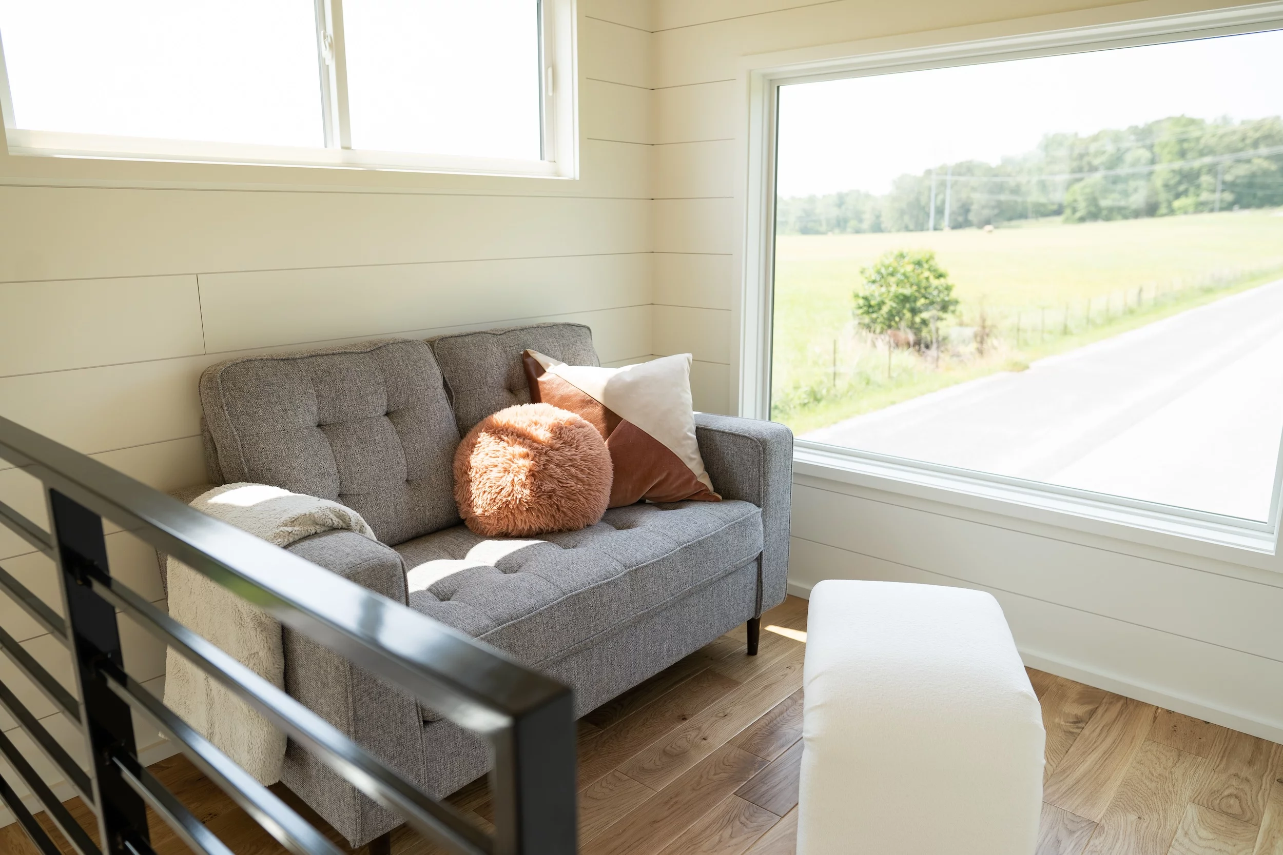 The Pingora's living room features a large window, framing excellent views of the surrounding area thanks to the room's raised position