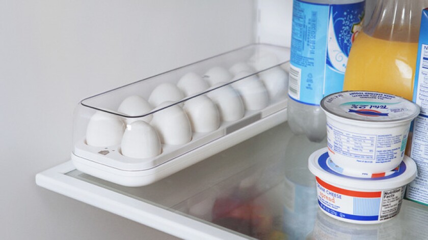 The Egg Minder holds 14 eggs