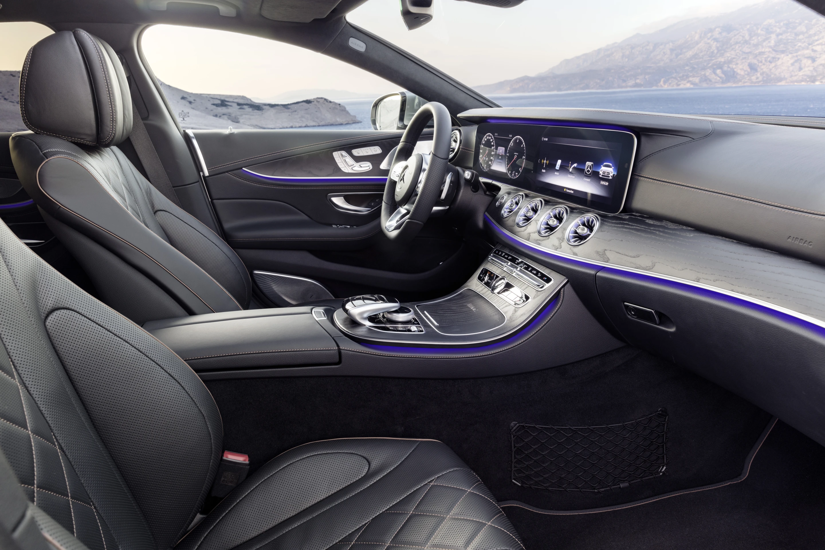 Lighting cues inside the CLS will also add information – ambient lighting can be set to any of 64 different hues and will briefly change color to indicate changes being made