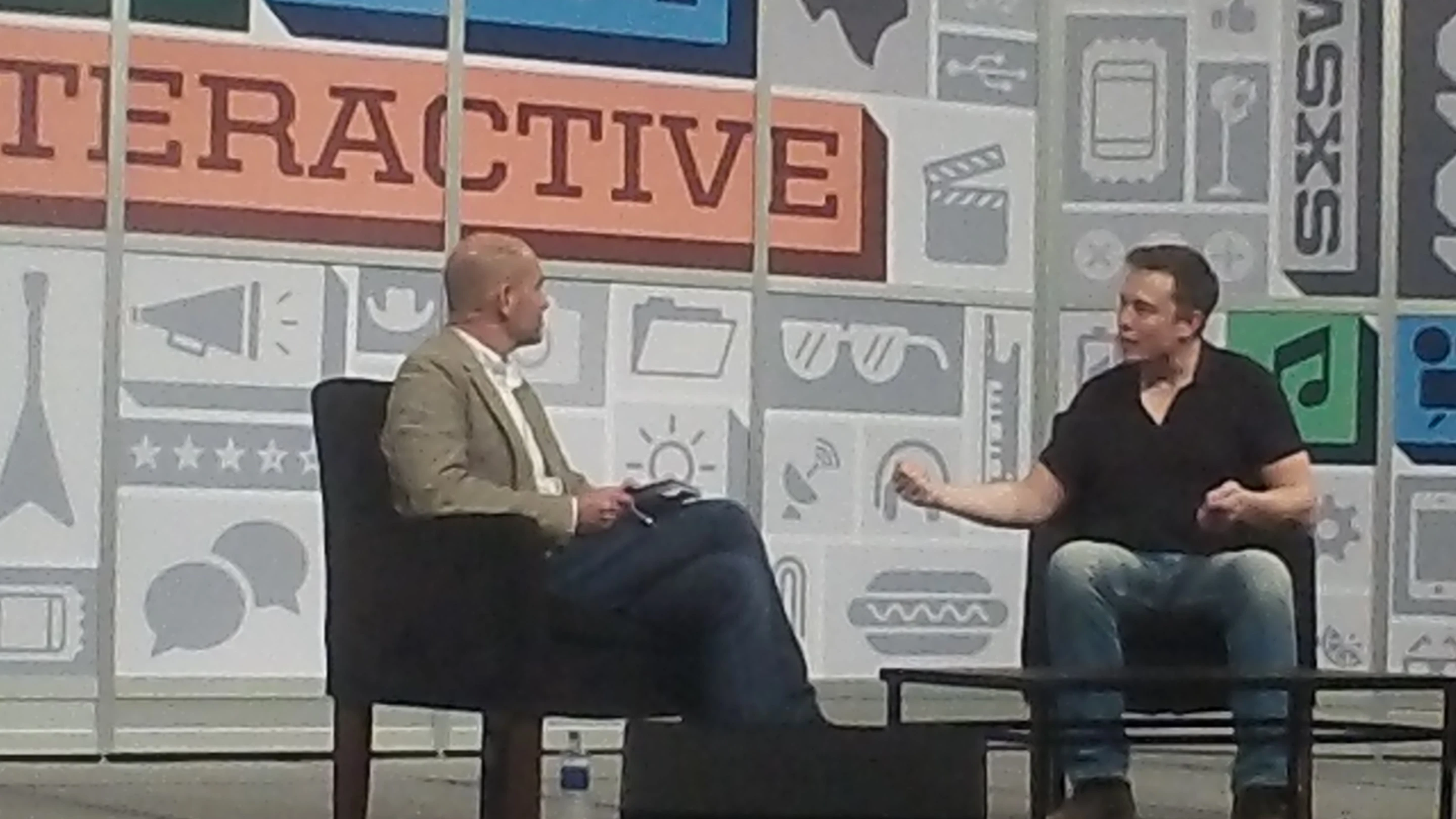 Elon Musk talks with Chris Anderson during his SXSW 2013 keynote