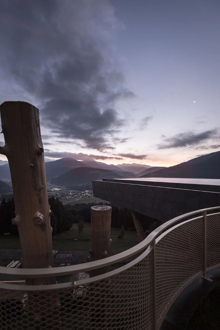 The pool appears to be propped-up by tree trunks