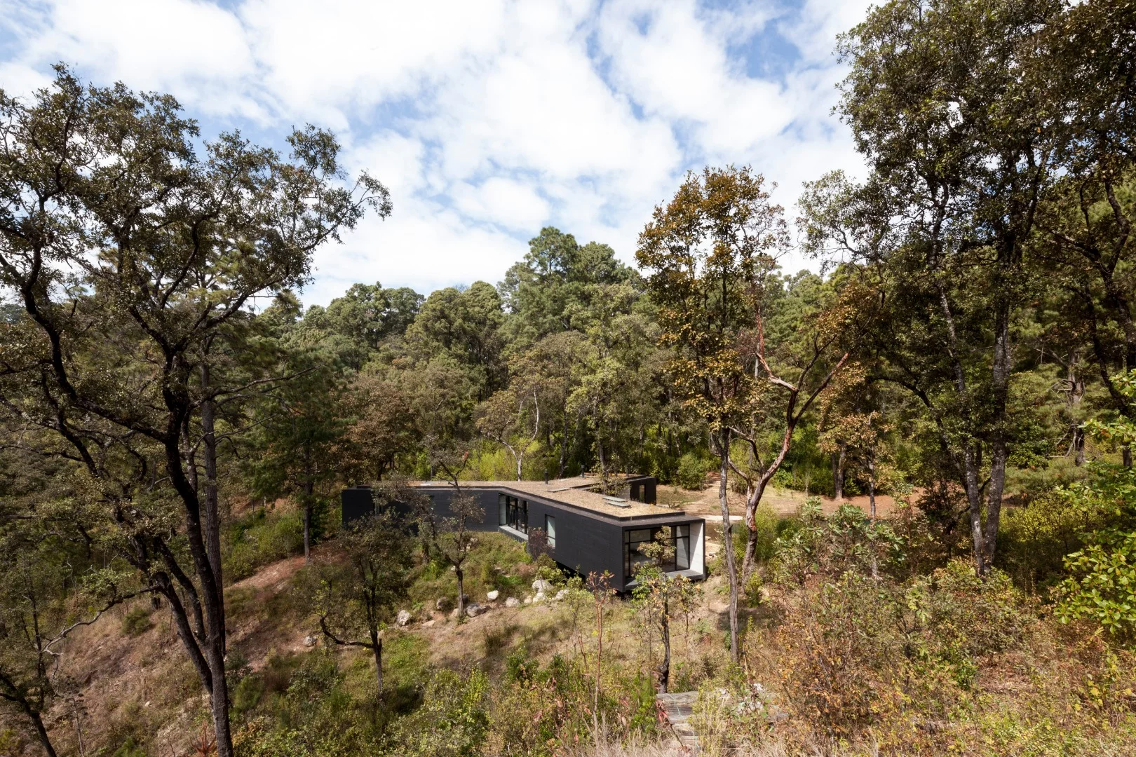 Ceramic is also used throughout the ceiling of the Casa de la Roca, as an important structural component to consolidate the timber beams