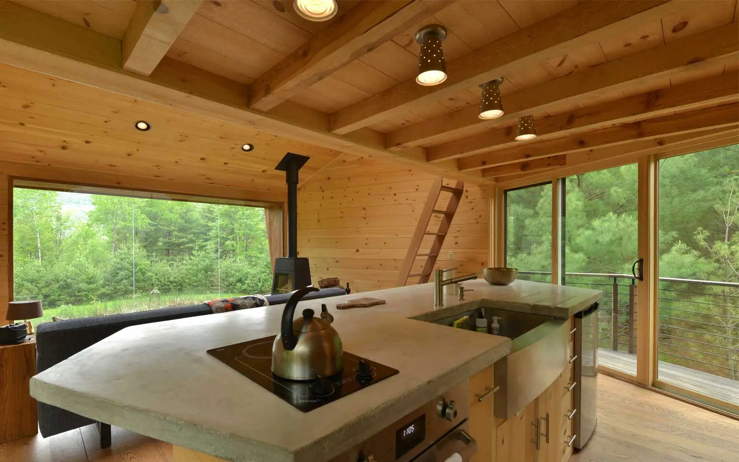 A ladder leads up to the master loft bedroom