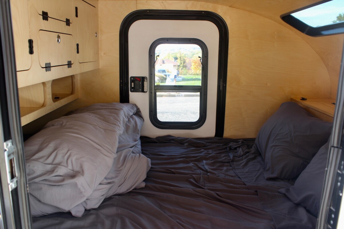 A nice part of the standard Topo package: it includes doors on each side for easier entry and exit — some trailer manufacturers offer only a single door standard