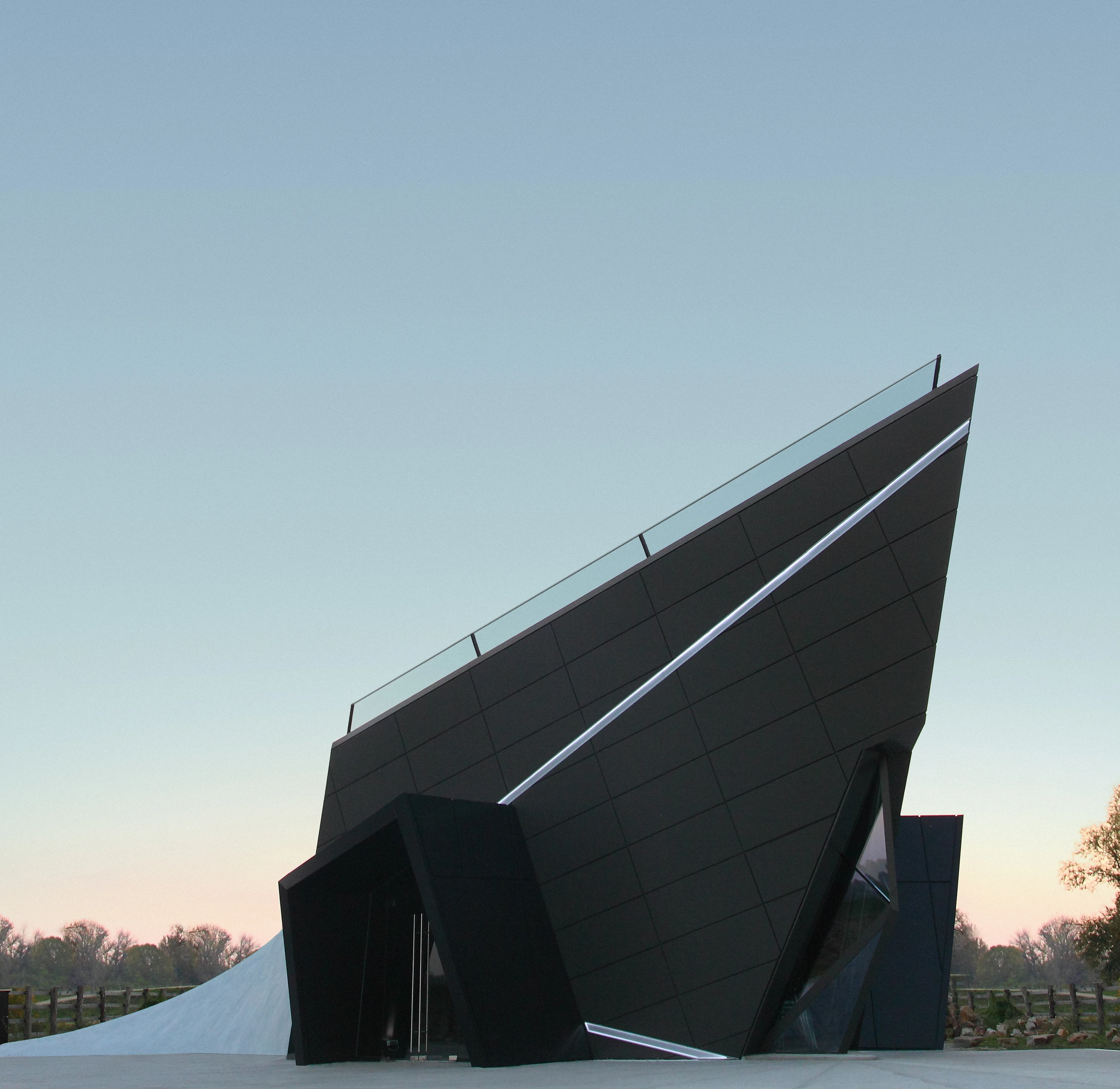 Romania's very first digital museum features a dramatic spire façade at its rear