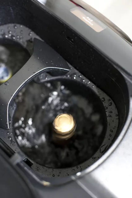 A wine bottle being spun in the V-Tex