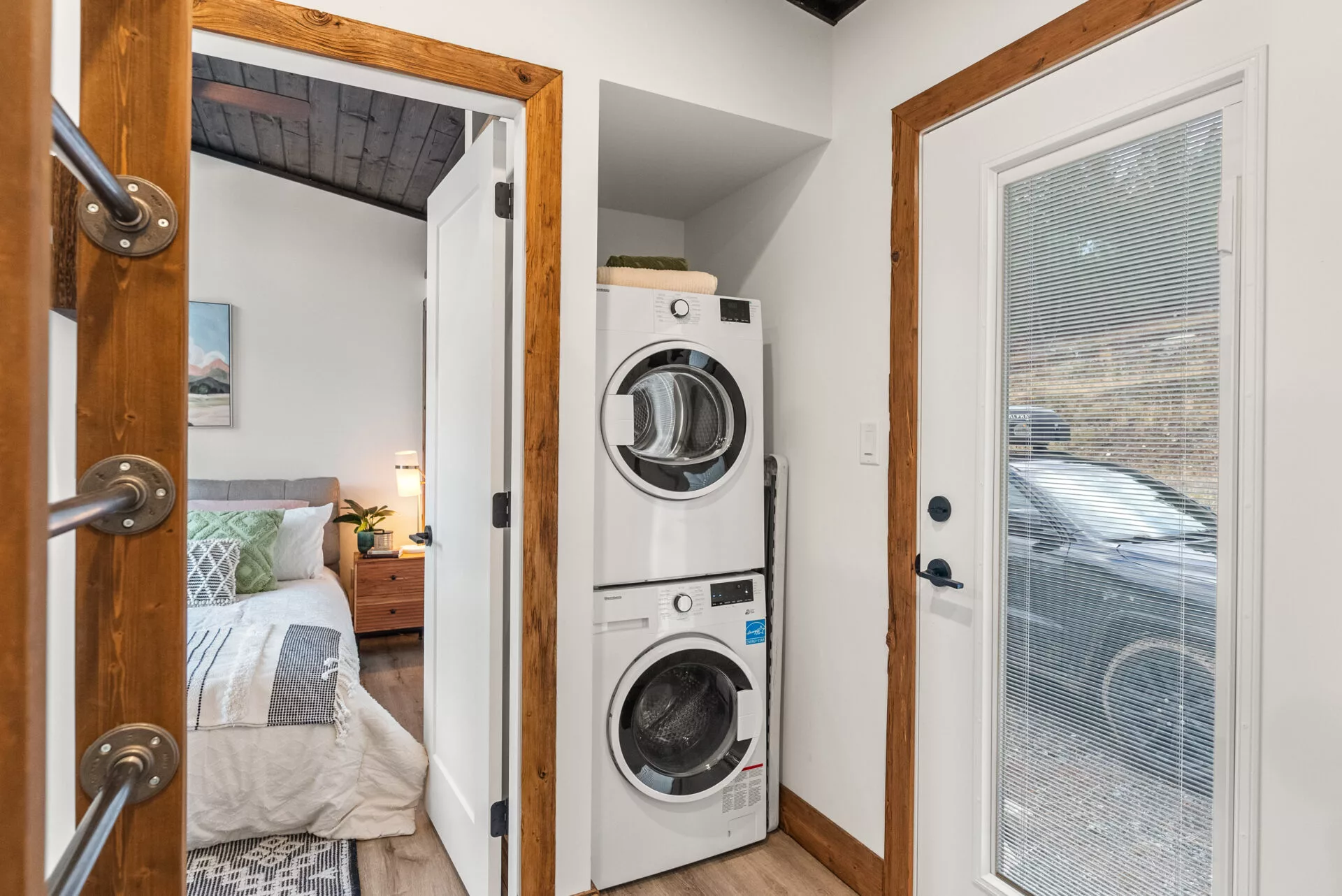 The Silvertip's hallway includes a secondary entrance plus a washing machine and dryer, as well as access to the home's loft-based bedroom