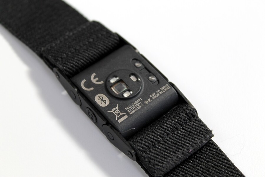 The rear of the PulseOn shows the optical sensor and contacts for charging the device