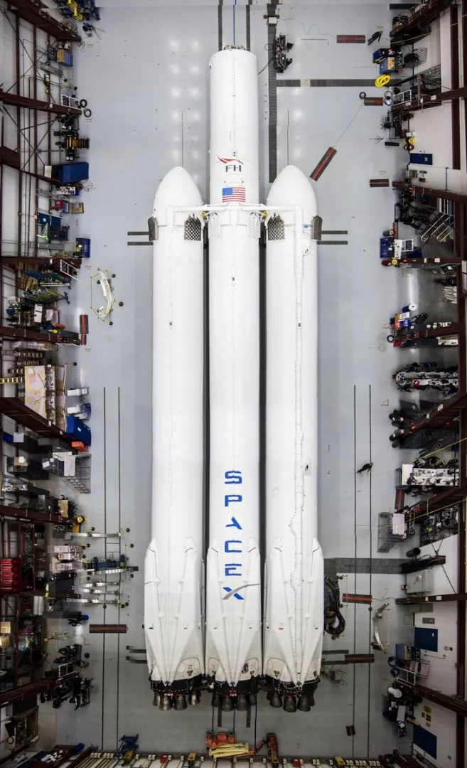 SpaceX's Falcon Heavy rocket, as seen from above, in the hangar at Cape Canaveral