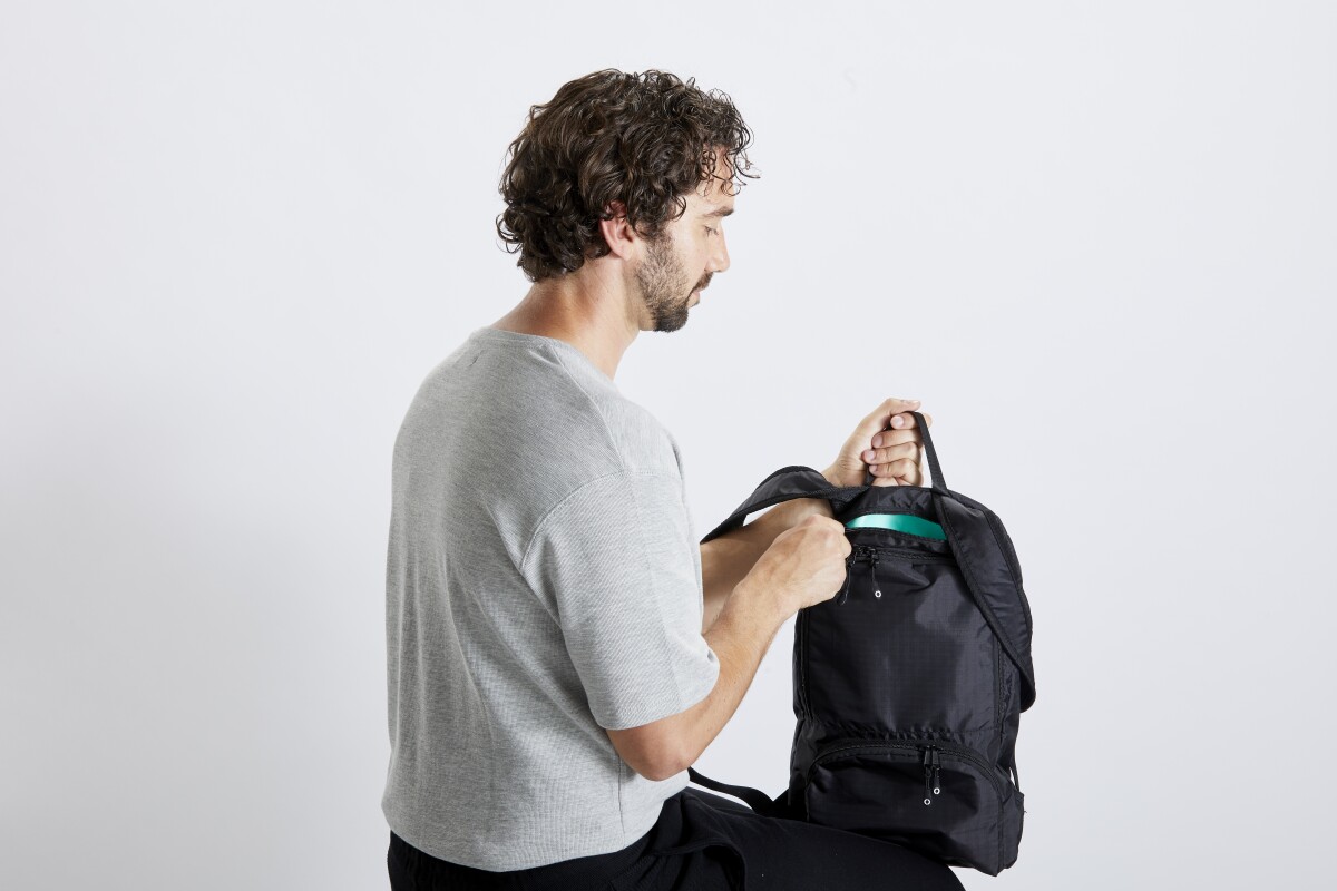 The RiutBag Crush is a secure daypack that can fold down into its own self-contained pocket