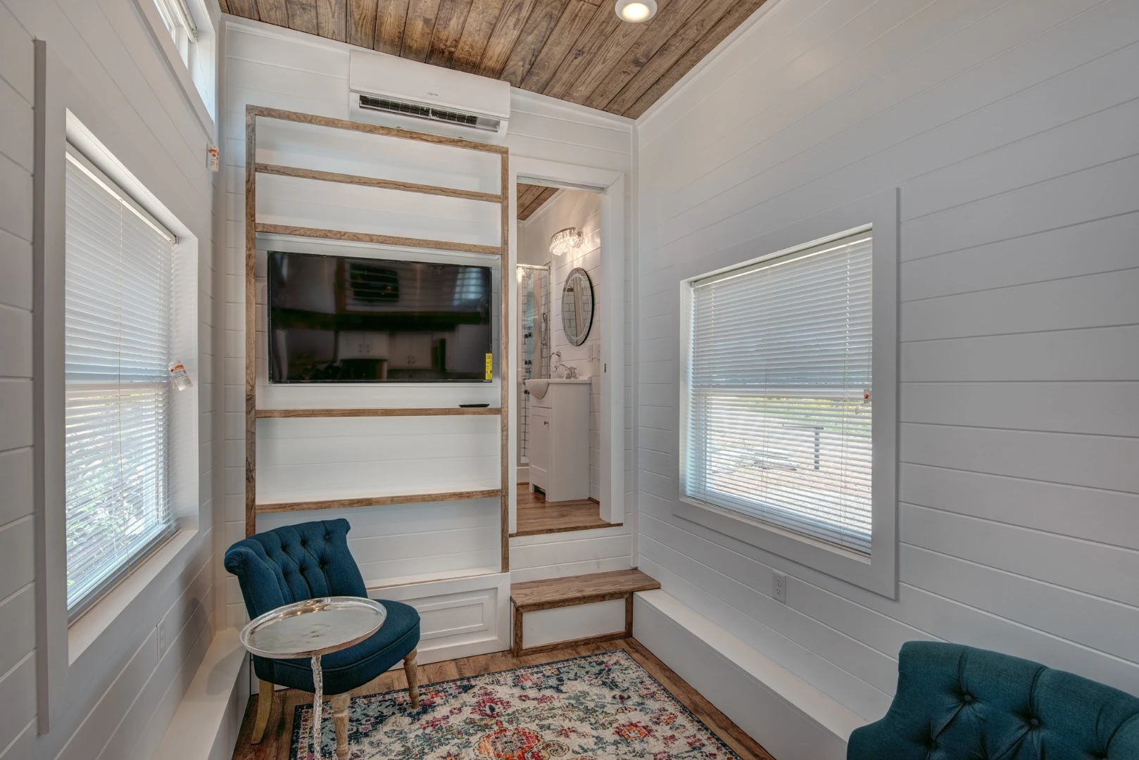 The high ceiling throughout the Journey tiny house gives this luxurious pint-sized dwelling a relatively spacious interior