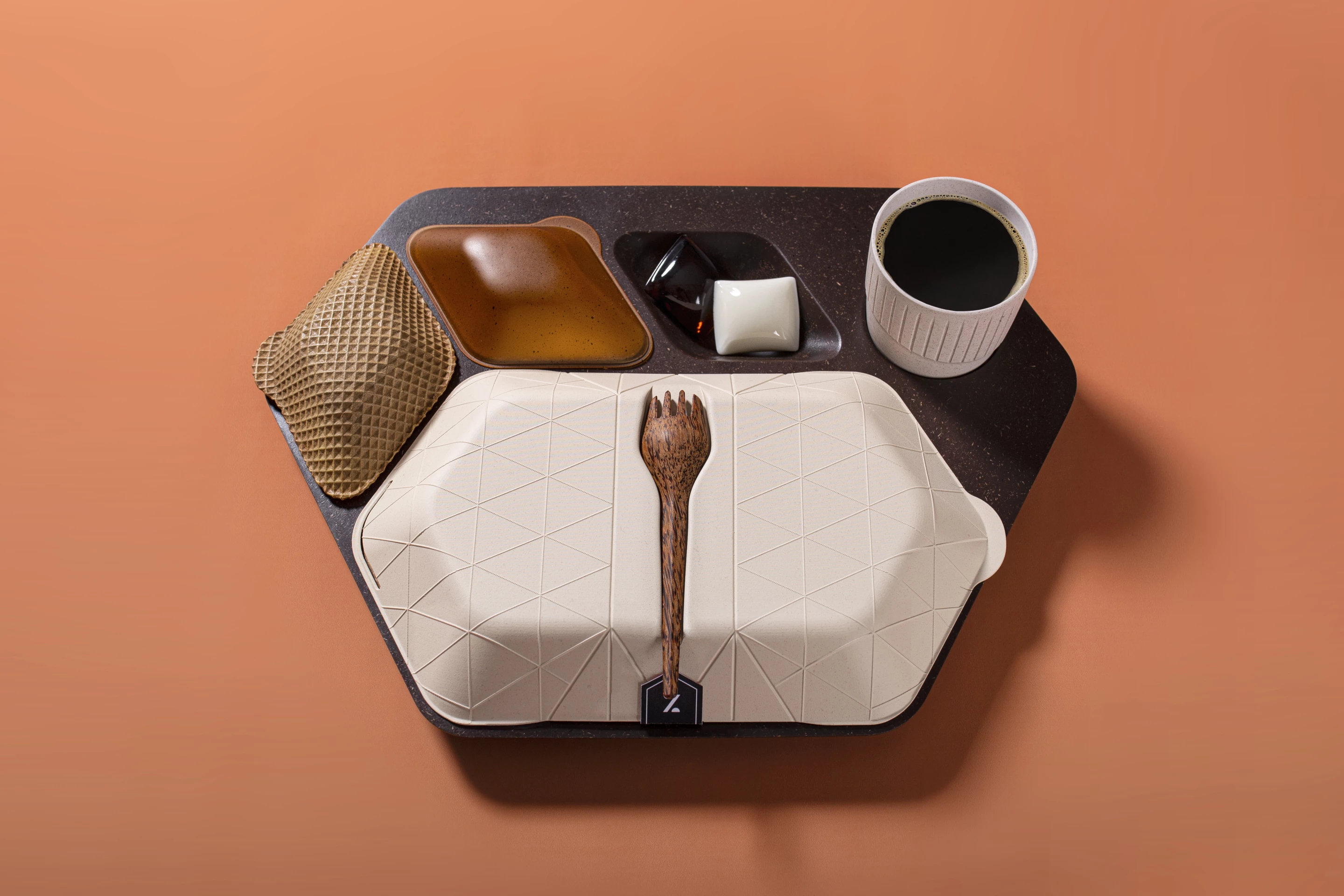 The in-flight meal tray is made from 100-percent biodegradable and commercially compostable materials